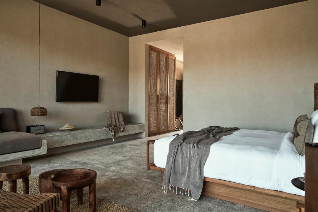 Junior-Suite-met-Kingsize-Bed-en-Gedeeld-Zwembad